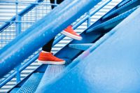 a person walking up a set of stairs